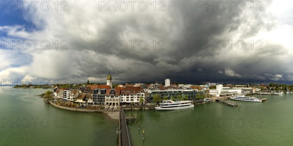 Panorama from the Moleturm tower onto the lakeside promenade of Friedrichshafen on Lake Constance as a thunderstorm approaches, Upper Swabia, Baden-Württemberg, Germany, Europe