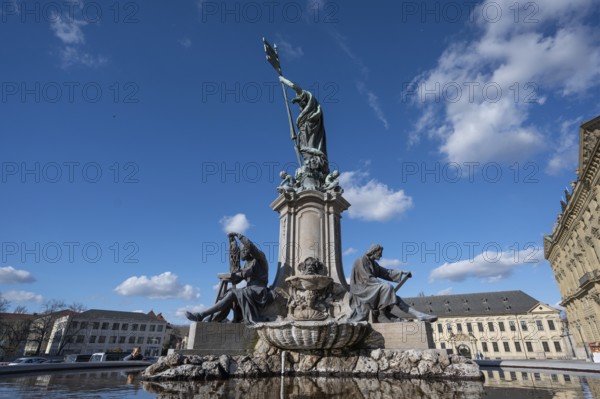 Frankoniabrunnen, neo-baroque, created in 1894, fountain figures and figure of Frankonia with the storm banner, Franconian racing flag in hand, Residenzplatz, Würzburg, Lower Franconia, Bavaria, Germany, Europe