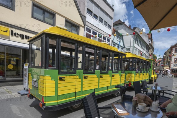 Tourist train runs through the town centre of Bad Kissingen, Lower Franconia, Bavaria, Germany, Europe