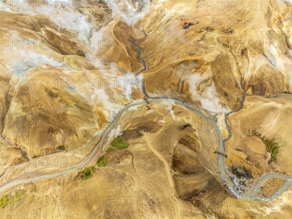Steaming hot springs and colourful rhyolite mountains, aerial view, Hveradalir geothermal area, Kerlingarfjöll, Icelandic highlands, Iceland, Europe