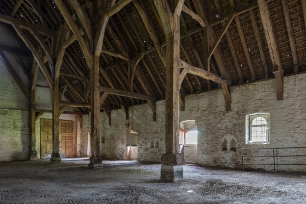 Interior showing wooden truss of 13th century Gothic monastic tithe barn of the Ter Doest Abbey at Lissewege near Bruges, West Flanders, Belgium, Europe