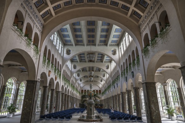 Promenade hall with fountain house with decorative Art Nouveau ceramic fountain made of majolica tiles, Kissingen spa, inaugurated in 1842, replaced by a new building in 1911, Bad Kissingen, Lower Franconia, Bavaria, Germany, Europe