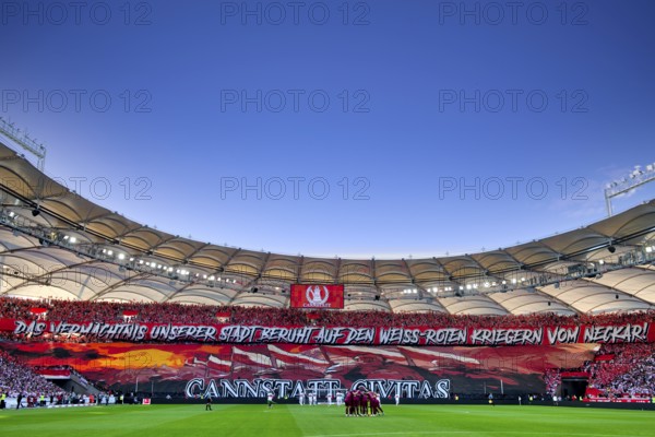 Long shot, overview, choreo, choreography, fan action recursion to Roman ancestors and warriors, atmospheric, Cannstatter Kurve, blue sky, MHPArena, MHP Arena Stuttgart, Baden-Württemberg, Germany, Europe