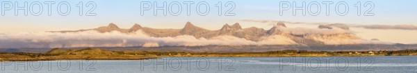 Panorama view of mountain chain 'seven sisters' near Sandnesssjøn, Helgeland, Norway, Europe