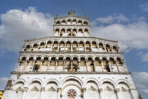 Round arches on the façade of the church of San Michele in Foro, historic city centre, Lucca, Tuscany, Italy, Europe