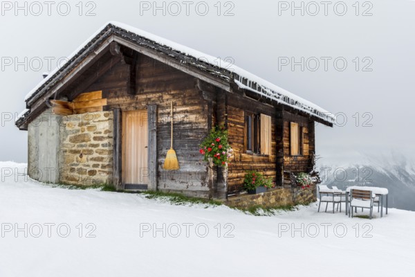 Lovingly decorated mountain hut, wooden hut, alpine hut, picturesque, broom, tourism, travel, winter holiday, winter, snow, Riederalp, Valais, Switzerland, Europe