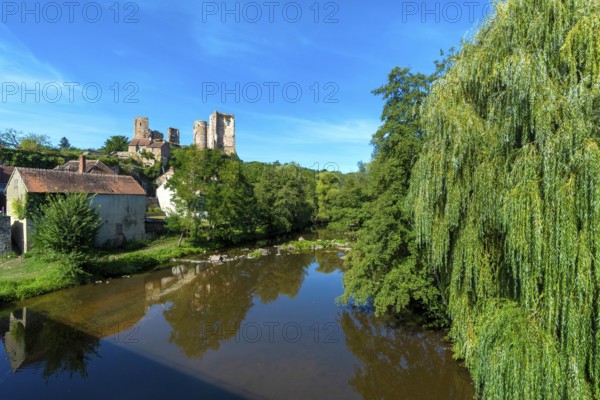 Herisson labeled Small City of Character. View on the castel of Ducs de Bourbon and river Aumance. Allier department. Auvergne Rhone Alpes. France
