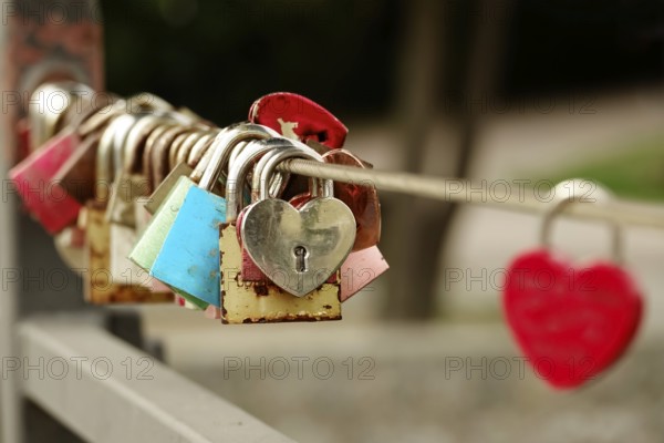 Love locks on a bridge railing, Bavaria, Germany, Europe