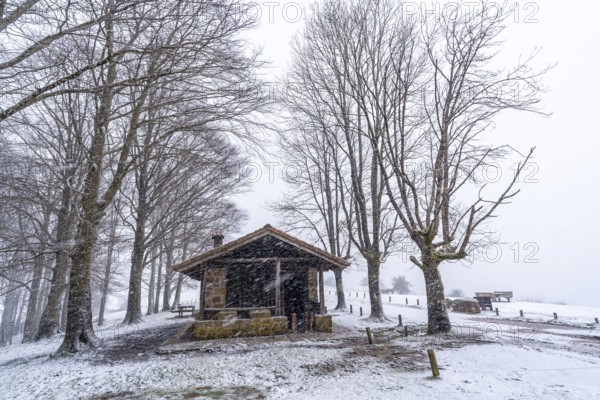 Beautiful refuge of the aizkorri mountain in gipuzkoa. Snowy landscape by winter snows. Basque Country, Spain, Europe