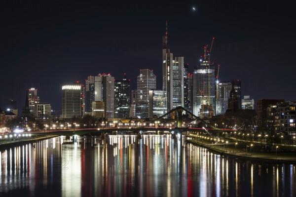 30 hrs and 21:30 hrs, only in greatly reduced form., Deutschherrnbrücke, Frankfurt am Main, Hesse, Germany, On the occasion of Earth Hour 2023, the lights of Frankfurt's banking skyline will shine on the evening of 25 March 2023, between 20, Europe