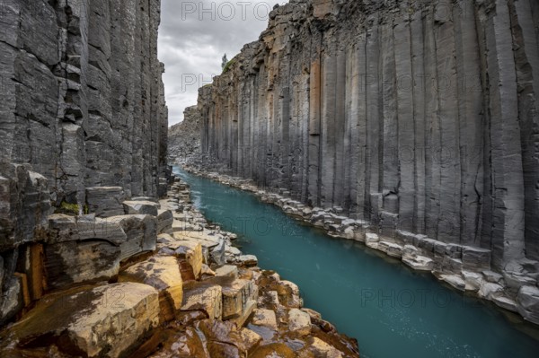 Stuðlagil Canyon, turquoise river between basalt columns, Egilsstadir, Iceland, Europe