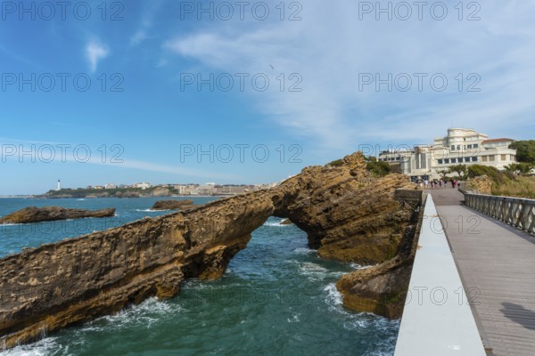 Wooden bridge together to Plage du Port Vieux in Biarritz, holiday in south-eastern France. Biarritz, department of Pyrenees-Atlantiques