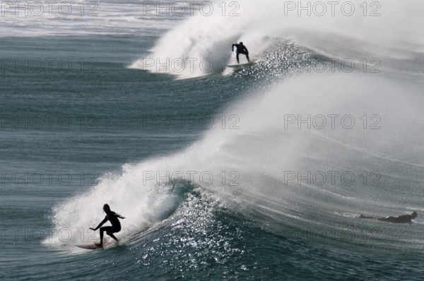 Fuerteventura, Canary Island, Surfers at Playa del Castillo in El Cotillo, Spain, Europe