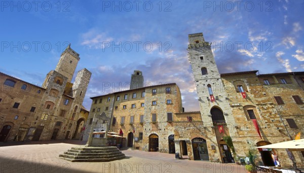 Medieval buildings of Piazza della Cisterna, San Gimignano, Tuscany Italy