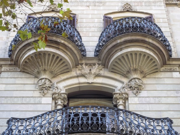 Beautifully shaped balconies on the modernist facade of a residential building, Barcelona, Catalonia, Spain, Europe