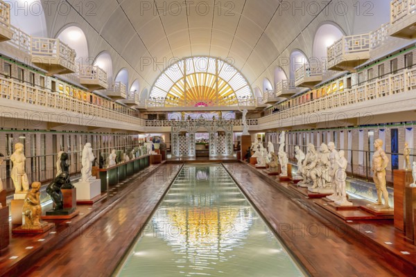 ROUBAIX, FRANCE, JUNE 14, 2024 : interiors Art Deco decors and sculptures of the olympic swimming pool La Piscine, built year 1927 by the Lille architect, Albert Baert