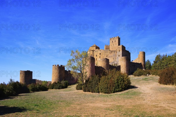 Loarre Castle is a Spanish fortress in the province of Aragon. The Spanish defensive structure was built a thousand years ago. Sunrise. Autumn trip to Spain