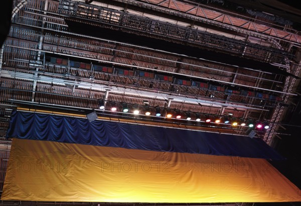 Dark theatre scaffold from low angle - construction background with spotlights