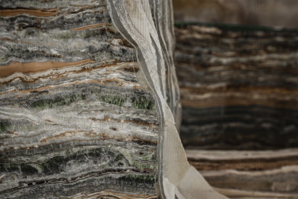 Multicolored marble with layered earthy tones and natural patterns, stone, natural stone, stone structure