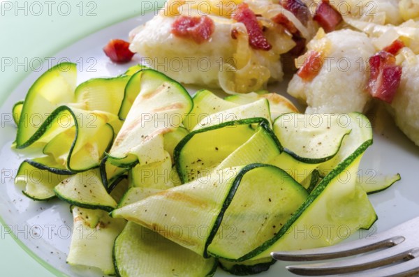 Silesian dumplings with Bacon and zucchini