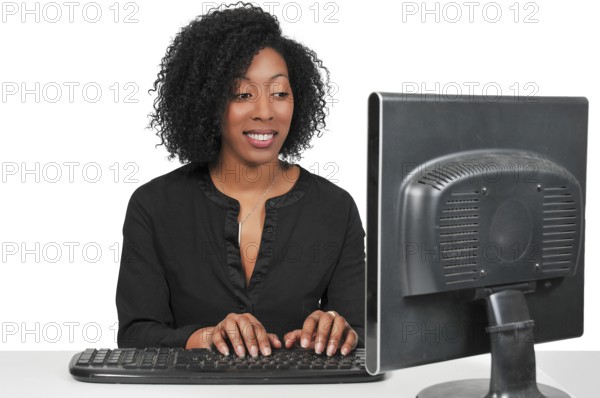 Woman executive or manager using a desktop computer