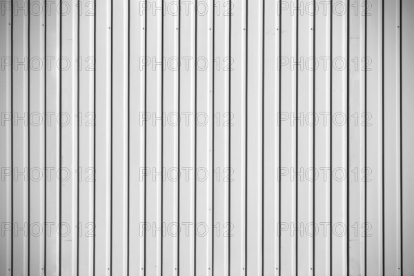 Close-up of the corrugated metal wall of a construction container