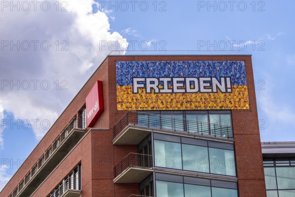 Modern architecture house in Berlin with a sign for peace. Modern architecture house in Berlin with a sign for Peace
