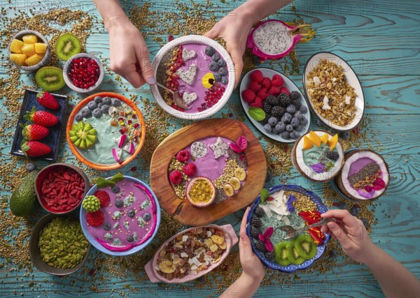 Acai bowl smoothie and Spirulina algae with chia berries and fruits healthy food
