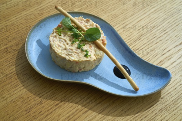 Spanish potato salad with salad and balsamic vinegar tapas starter