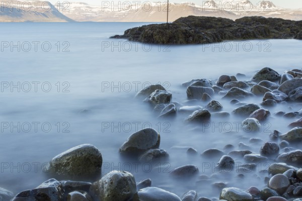 Time exposure of stones in the Westfjords coast, Iceland, Europe