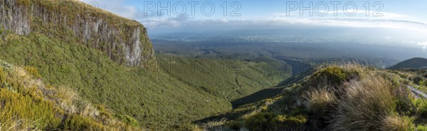 Hiking the Mount Taranaki on a sunny summer day, New Zealand, Oceania