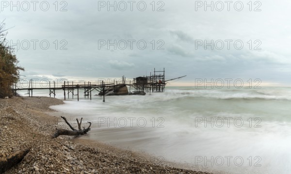A view of the Trabocco Punto le Morge pile dwelling on an overcast an rainy day on the Costa dei Trabocchi in Italy