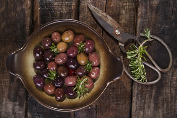 Italian food, snack of olives in brine presented in flat