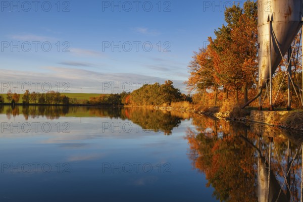 Farm for breeding fish. Evening on the breeding pond. Czech Republic