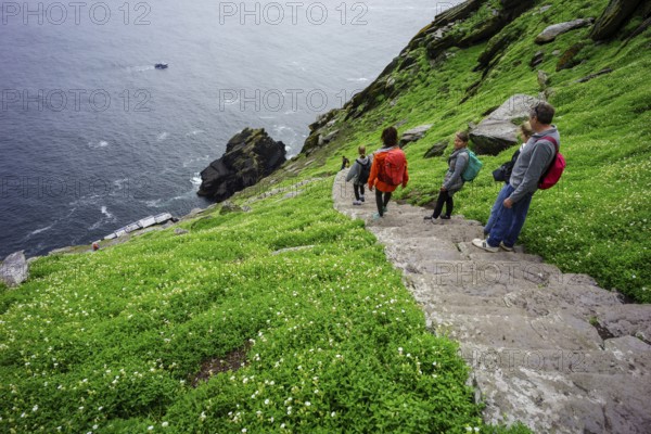 Visitors on the steep path up to the monastery, Skellig Michael island, Mainistir Fhionáin (St. Fionan?s Monastery), county Kerry, Ireland, United Kingdom, Europe