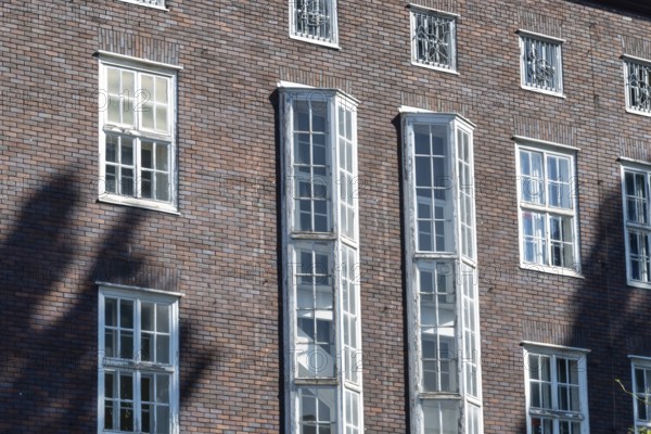 Facade of an modern large house, wall with windows
