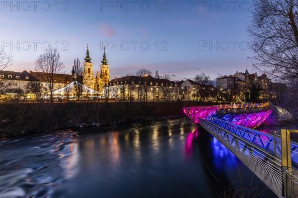 Illuminated Murinsel, Mariahilferkirche in the background, night shot, Graz, Styria, Austria, Europe
