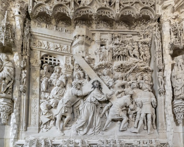 Burgos, Spain, 14 April, 2024: sculpture of Jesus carrying the cross on the retrochoir wall of the Burgos Cathedral, Europe