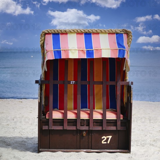 Beach chairs on Timmendorfer Strand on the Baltic sea with blue sky