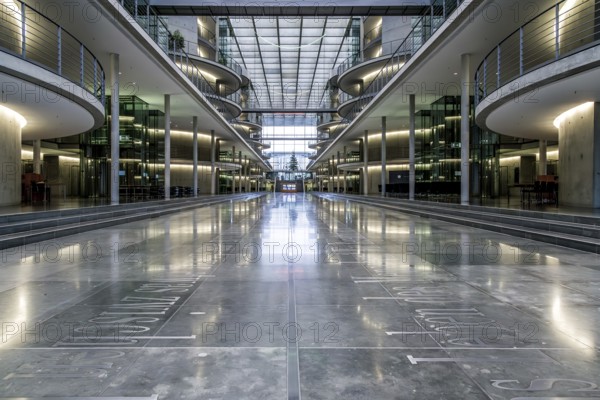 Interior design of the Paul Loebe building, part of the German Bundestag in Berlin, bright, modern interior with symmetrical corridors and glass roof, Reichstag Berlin