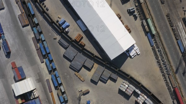 Aerial top view of cargo container terminal with railway, business transportation logistic in trade port