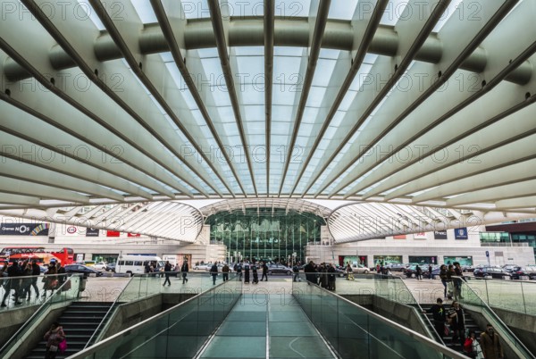 Lisbon, Portugal: 12 28 2018: Travellers walking in and out the Oriente railwaystation