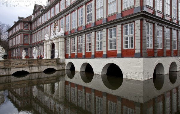 Wolfenbüttel Castle Portal façade partial view with moat and castle bridge present appearance 1714-17 by Hermann Korb Sculpture by Franz Finck