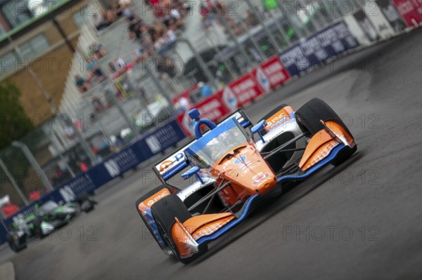 SCOTT DIXON (9) of Auckland, New Zealand runs through the streets during the Honda Indy Toronto in Toronto, ON, CAN