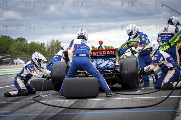 LINUS LUNDQVIST (R) (8) of Stockholm, Sweden comes down pit road for service during the XPEL Grand Prix at Road America in Elkhart Lake, WI