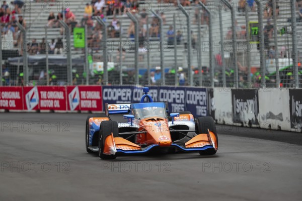 SCOTT DIXON (9) of Auckland, New Zealand runs through the streets during the Honda Indy Toronto in Toronto, ON, CAN