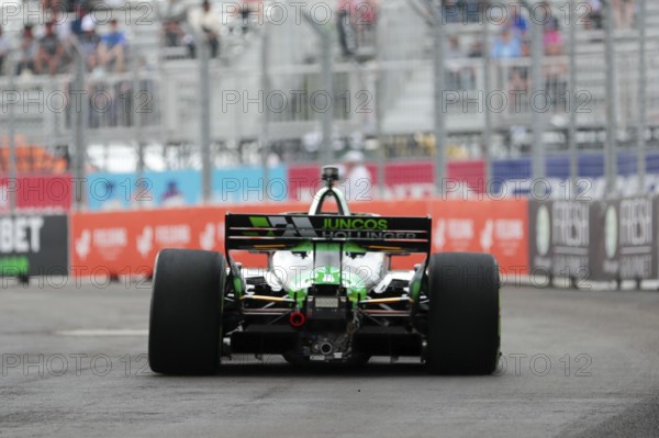 CALLUM ILOTT (77) of Cambridge, Cambridgeshire, England runs through the streets during the Honda Indy Toronto in Toronto, ON, CAN