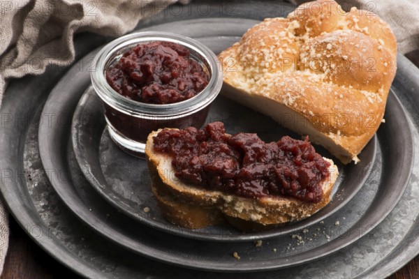Sweet bread (challah) with cherry jam