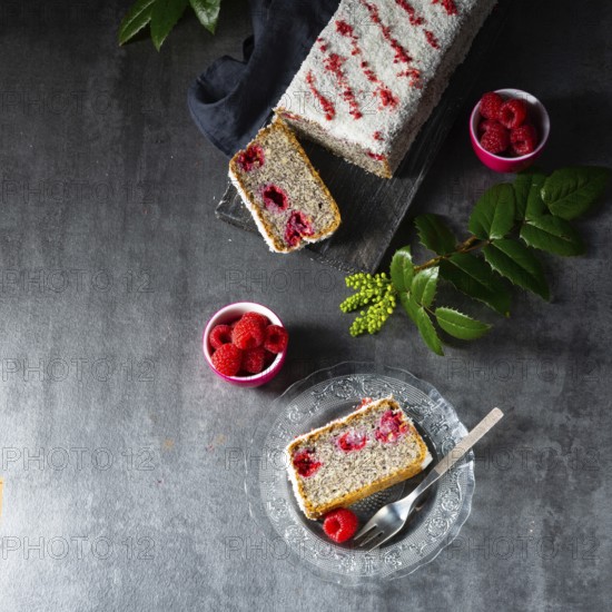 Poppy seed cake with raspberries and desiccated coconut