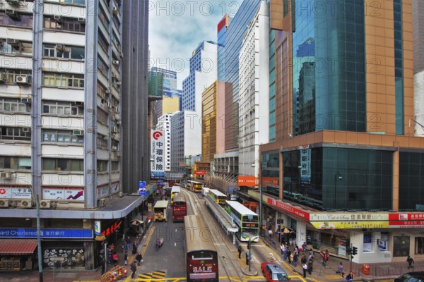 HONG KONG - DECEMBER 11, 2014: Hong Kong Special Administrative Region, China. Ultra-modern skyscrapers and narrow streets between them